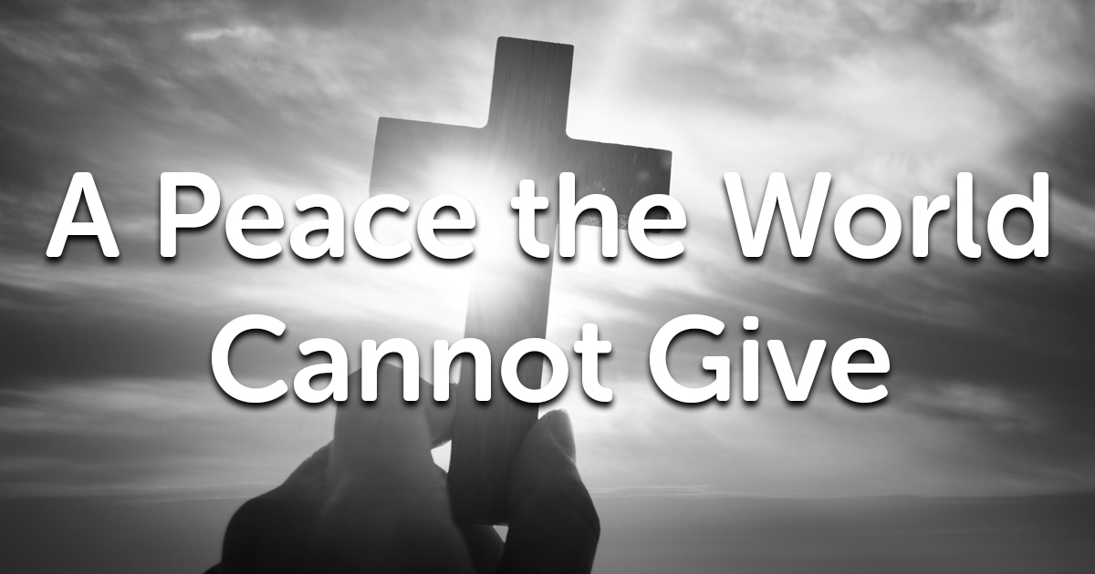 A silhouetted hand holds up a cross against a dramatic sky with the sun shining behind it. The text overlay reads, "A Peace the World Cannot Give." The image is in black and white.