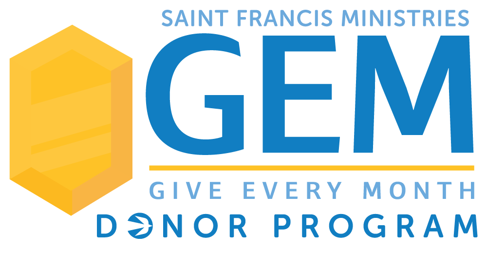 The image is a logo for Saint Francis Ministries' GEM (Give Every Month) Donor Program. It features the text "Saint Francis Ministries GEM Give Every Month Donor Program" and an icon of a yellow hexagon with a stylized 'S' inside it.